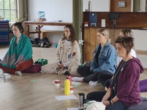 Yoga teachers in meditation